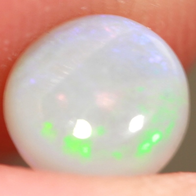 SOLID CRYSTAL OPAL Bright green rolling flash